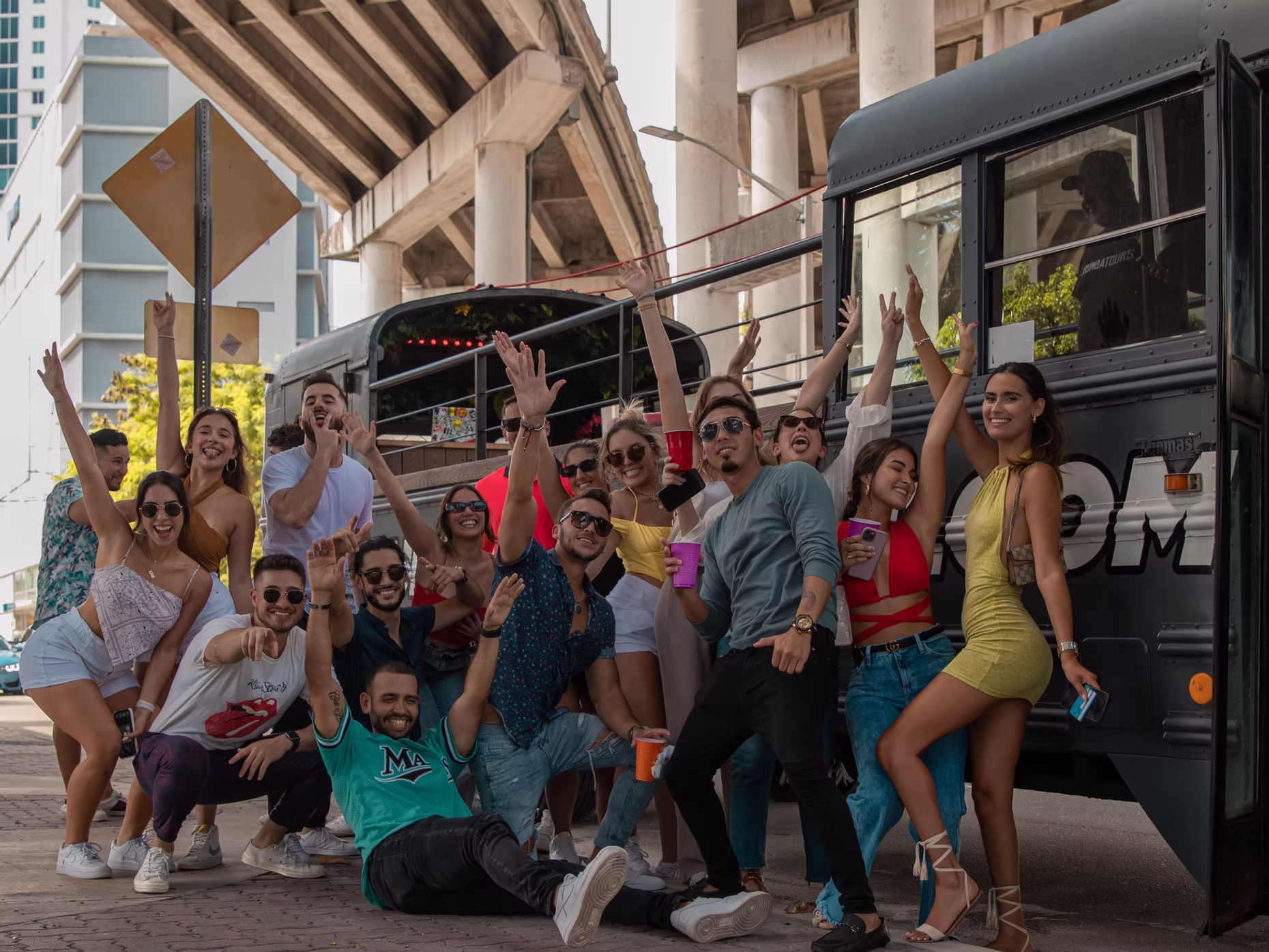 Rumba Tours Miami open-air party bus driving through the city