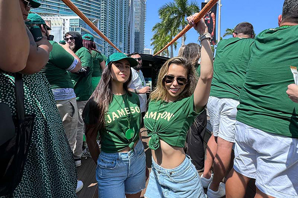 Team celebrating on a corporate party bus